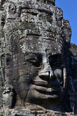 Fototapeta na wymiar Face Sculpture on Prasat Bayon