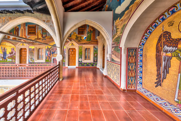 Fototapeta na wymiar Arcade with mosaics in famous monastery