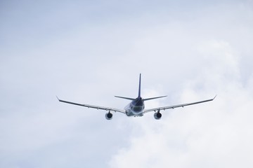 Fototapeta na wymiar Airplane take off on the blue sky for transportation