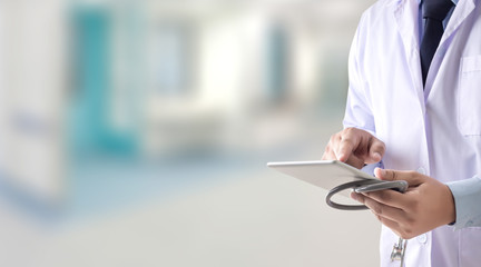 Doctor listening something success smart medical stethoscope. doctor hard working. man doctor concept in hospital.  and copy space