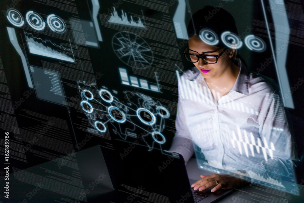 Poster woman engineer looking at various information in screen of futuristic interface.
