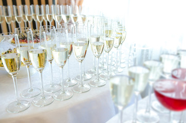 Champagne in the glases on the table