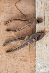 Old and Vintage carpenter tools on the old and dirty wood background