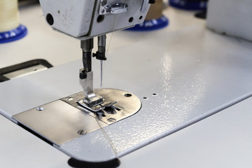 Sewing machine for sewing shoes.