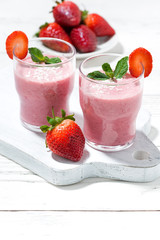 refreshing strawberry milkshake, vertical