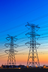 high voltage post,High voltage tower sky sunset background