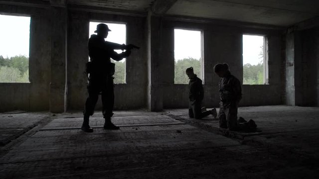 Armed guard and hostages