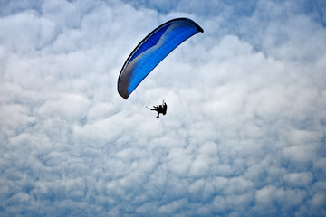 Paragliding along beautiful coastline.