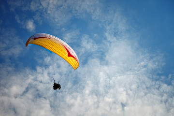 Paragliding along beautiful coastline.