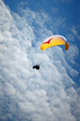 Paragliding along beautiful coastline.