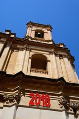 St Augustine Church bell tower along Old Bakery Street, Valletta, Malta.