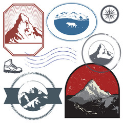Retro post stamps or badges set with mountains