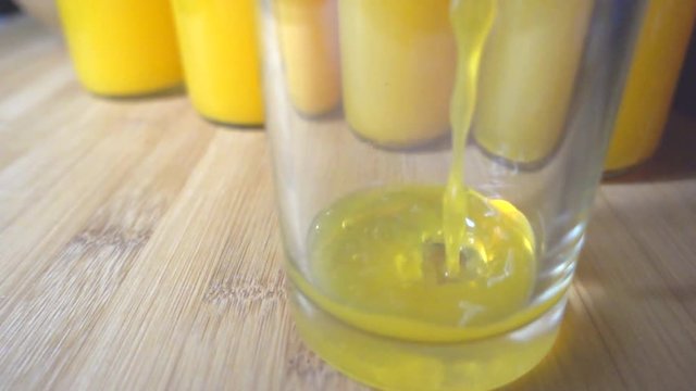 Pouring orange juice, slow motion 500fps