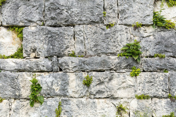 Old grungy gray stone wall texture