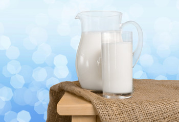 Pitcher  with some milk