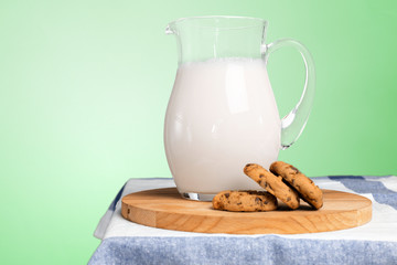 Pitcher  with some milk