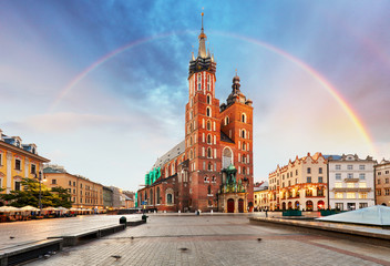 Fototapeta na wymiar St. Mary's basilica in main square of Krakow with rainbow