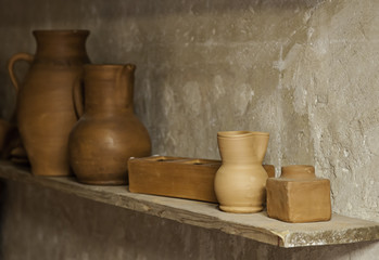 Fototapeta na wymiar Craft pottery vessels in a pottery