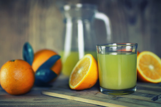 toned orange juice glass slice