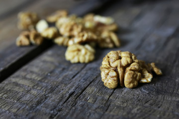 peeled walnut on a wooden background