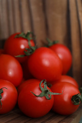Fresh bright and juicy tomatoes on the kitchen