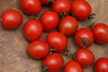Fresh bright and juicy tomatoes on the kitchen