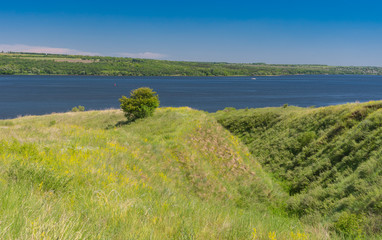 Fototapeta na wymiar Early summer landscape with hilly Dnipro riverside, Ukraine