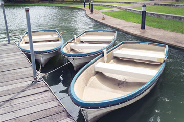 rental row boats in park, filter effect