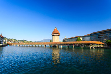 Fototapeta na wymiar View at the Chapel bridge over Reuss river in Luzern (Lucerne).