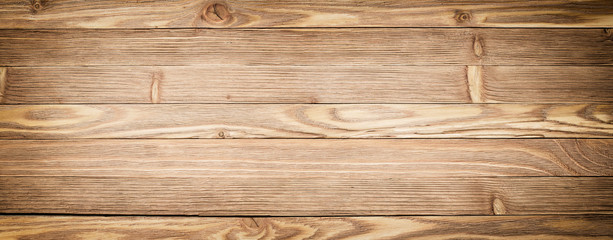 Panorama wooden background. Light wood texture close-up. Plank table or floor