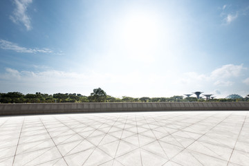 empty floor near park in blue sky