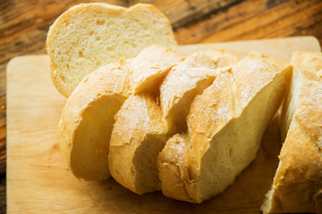 White bread on a white towel with milk