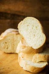 White bread on a white towel with milk