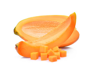 half adn slice of fresh papaya with cubes isolated on white background