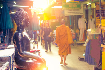 Bangkok, Thailand - June, 21, 2017 : Black buddha statuse in amulet market and unidentified old...