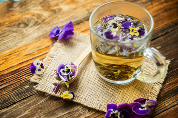 herbal tea on a white wooden background