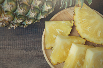 pineapple on the wood texture background
