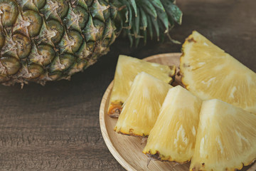 pineapple on the wood texture background
