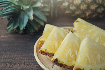 pineapple on the wood texture background