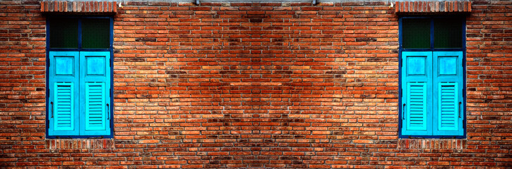 Brick wall with brick filled window - Old weathered brick wall with window - Crack brick wall texture background - Interior or exterior brick wall building decoration texture background panoramic view