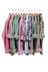 colorful blouses hanging on a clothes rod