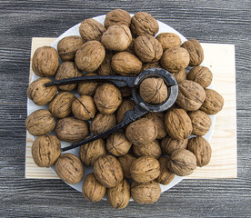 Plates of natural walnuts and walnut crumbs
A plate of dry walnuts, the most wonderful walnut pictures

