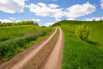 rut road over green hill