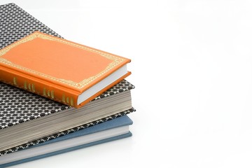 A stack of books on a white background