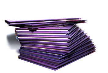 A stack of lying books on a white background