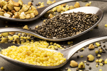 Chia, millet and buckwheat on a spoon