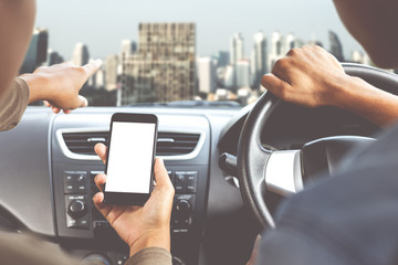 couple using phone inside car in city direction mobile app concept