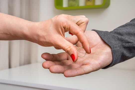 Woman returning wedding ring to her ex-husband