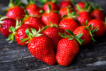Fresh strawberry on wooden background