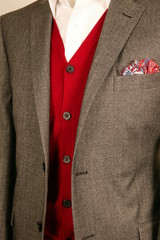 close up of man in a suit with tie and handkerchief